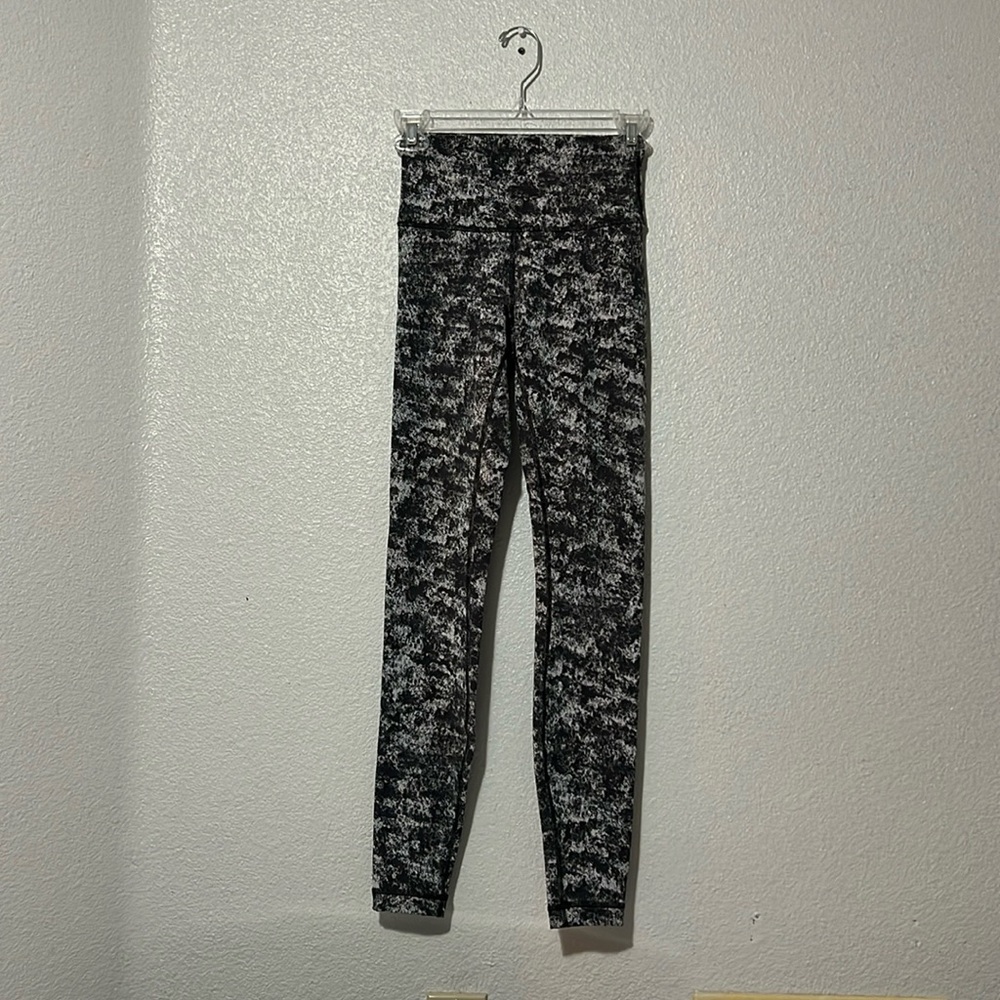 Lululemon leggings. Grey/black, size 4. Used, but good condition.